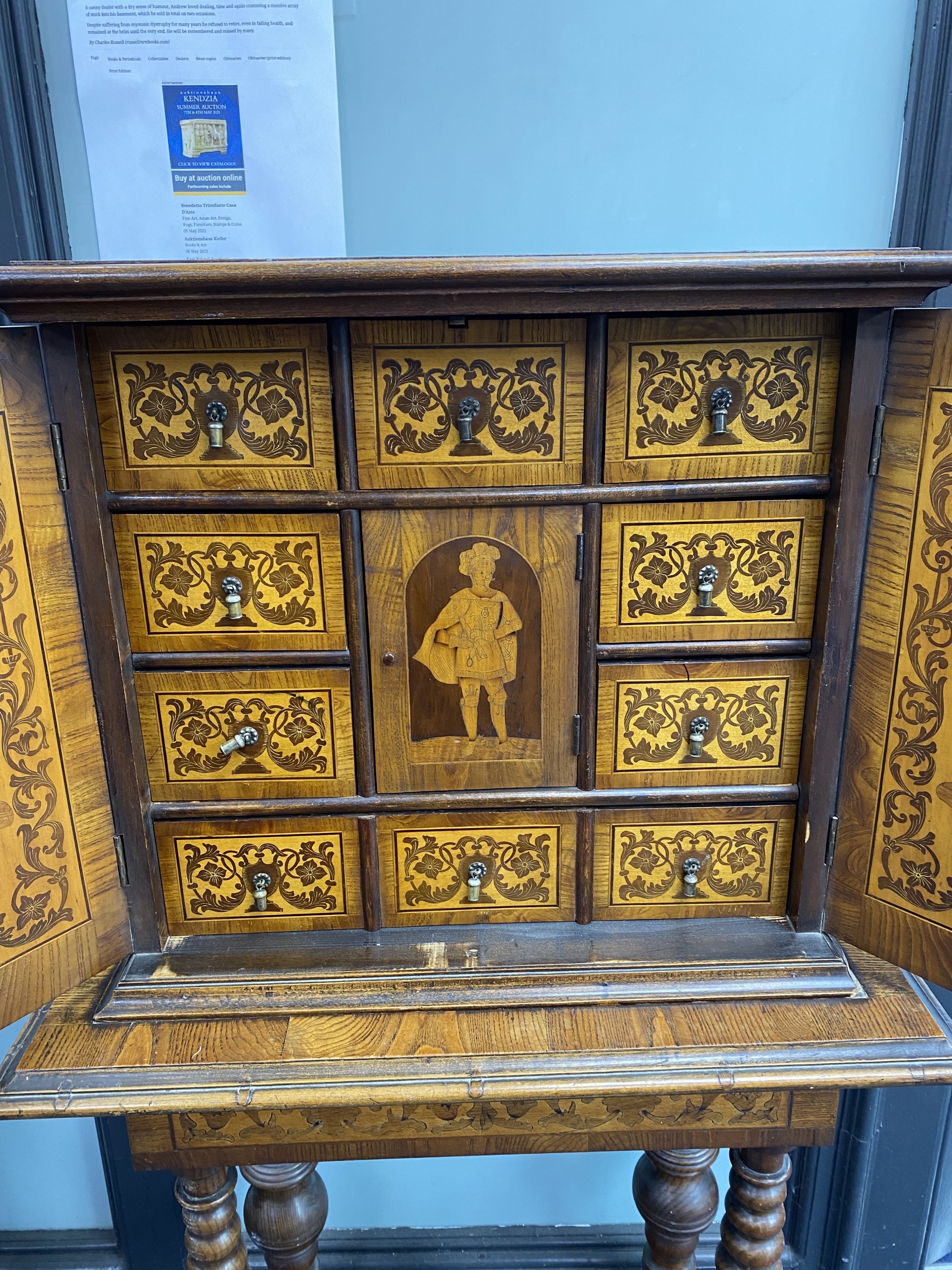 A Continental marquetry cabinet on stand, width 65cm, depth 36cm, height 126cm